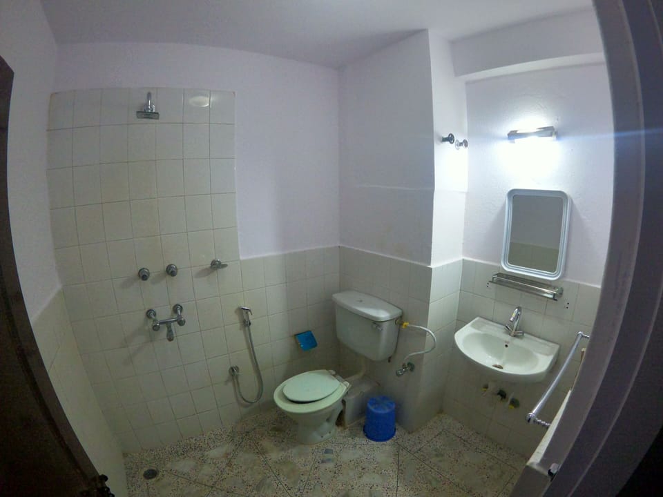 Economy Triple Room, 3 Bedrooms, Private Bathroom | Bathroom | Free toiletries, hair dryer (on request), slippers, towels