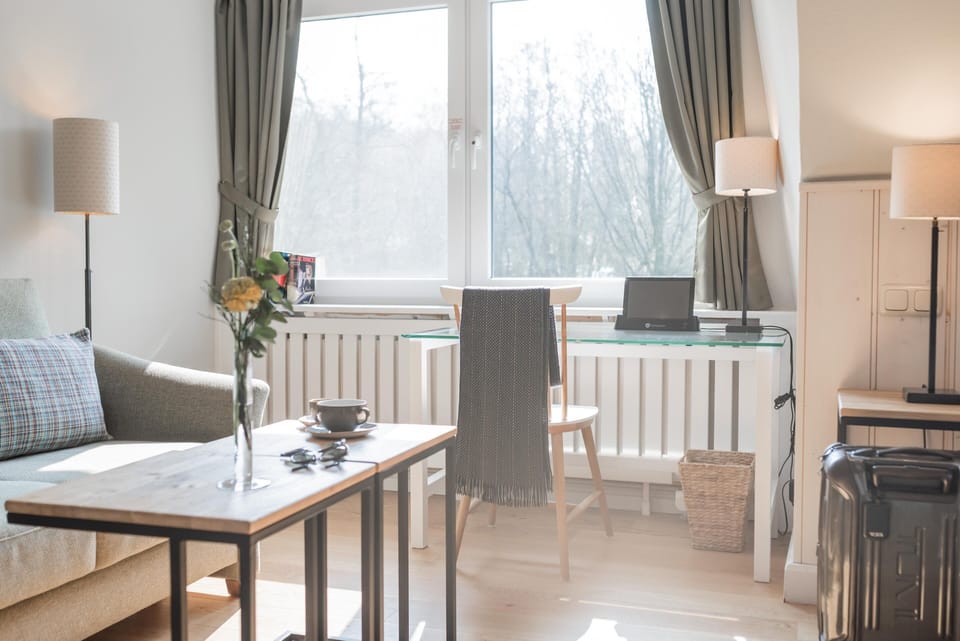 Comfort Room, Lake View | Individually decorated, individually furnished, desk, iron/ironing board