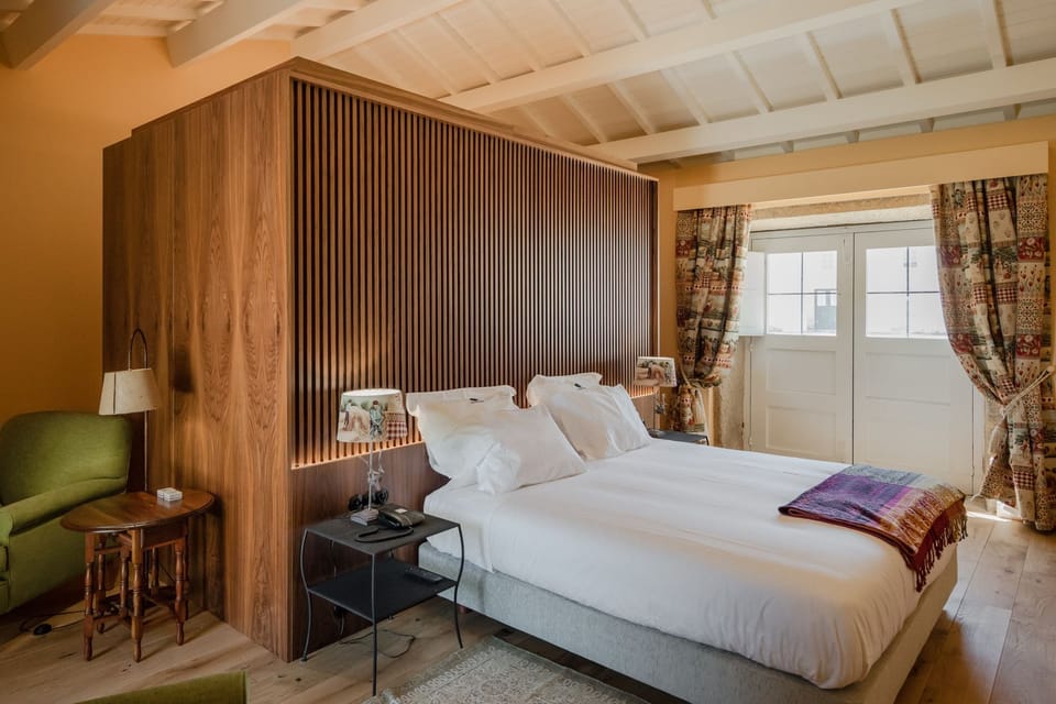 Double Room | Minibar, in-room safe, blackout drapes, cribs/infant beds