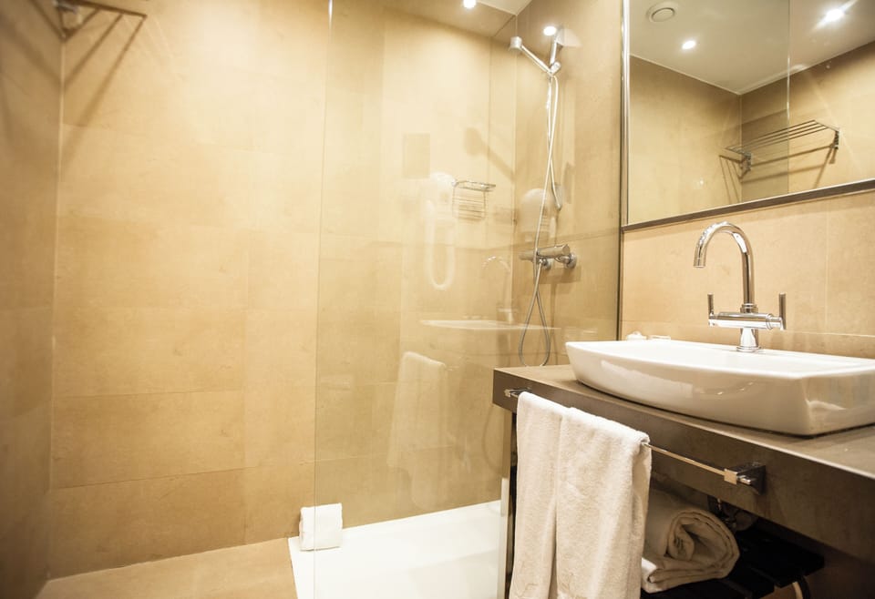 Free toiletries, hair dryer, bidet, towels