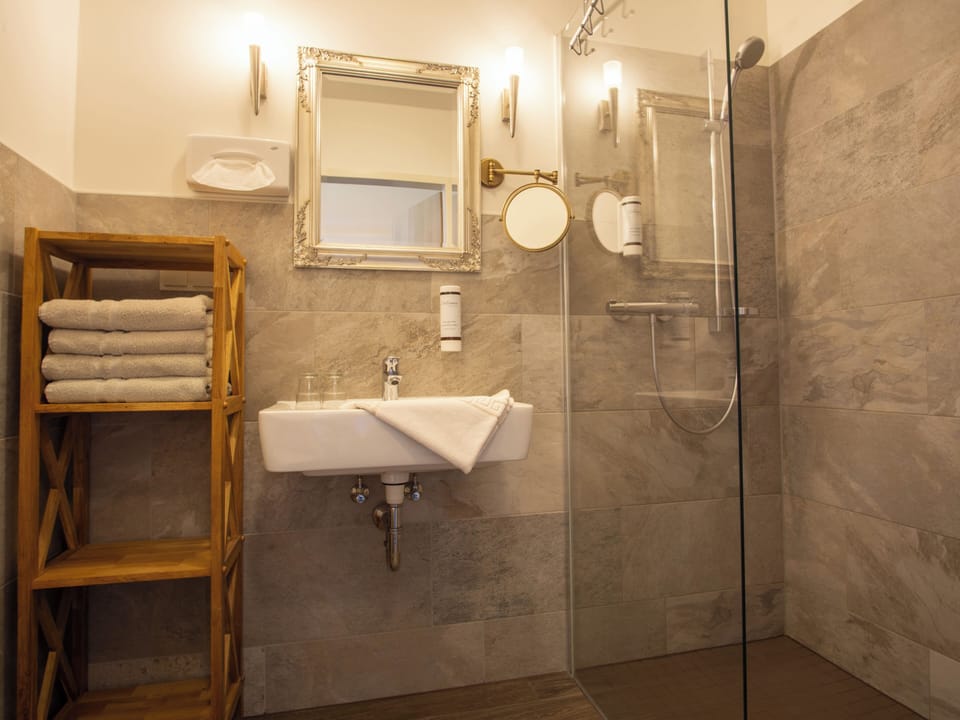 Shower, free toiletries, hair dryer, towels
