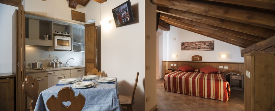 Quadruple Room, Kitchen | Minibar, desk, cribs/infant beds, free WiFi