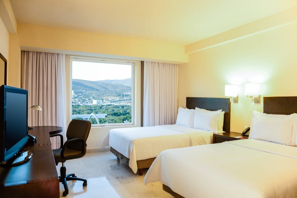 Superior Room 2 Doubles | In-room safe, desk, laptop workspace, blackout drapes
