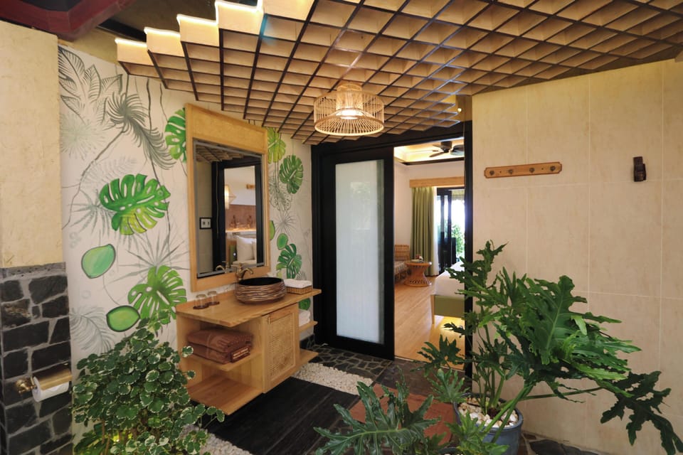 Serene Elite Premier Beach Front Bungalow | Bathroom | Designer toiletries, hair dryer, bathrobes, slippers