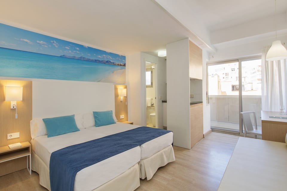 Desk, laptop workspace, free WiFi, bed sheets