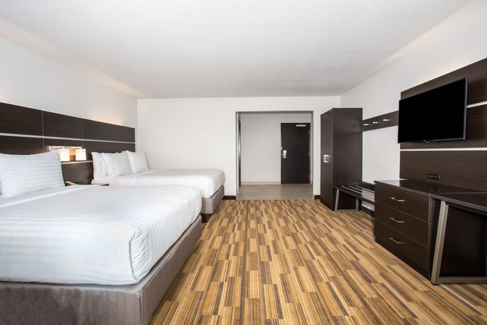 In-room safe, desk, blackout drapes, free cribs/infant beds