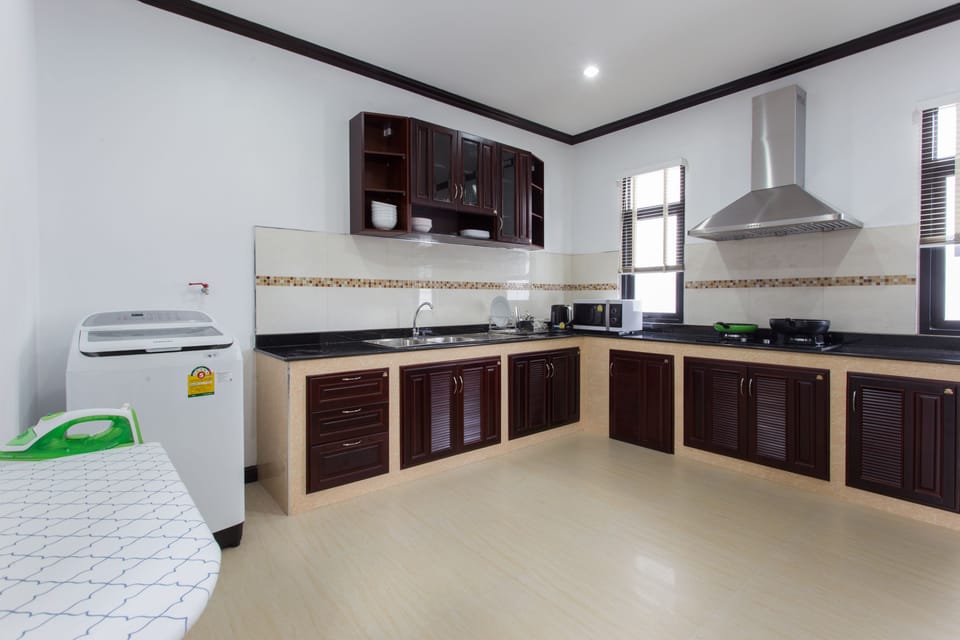 4 Bedrooms Private Pool Villa | Private kitchen | Full-size fridge, microwave, stovetop, electric kettle