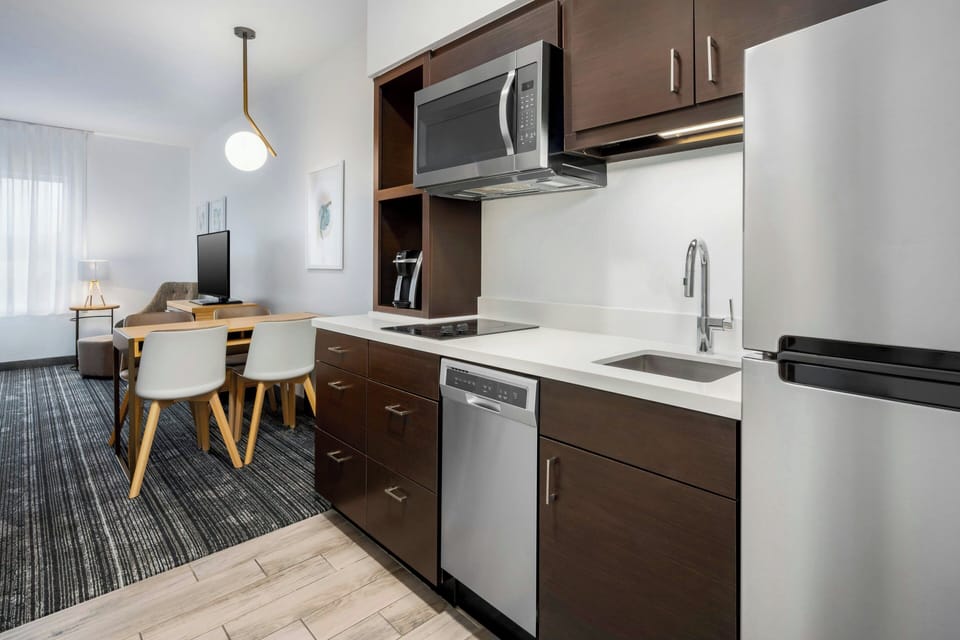Studio, 2 Queen Beds | Private kitchen | Fridge, microwave, dishwasher, coffee/tea maker