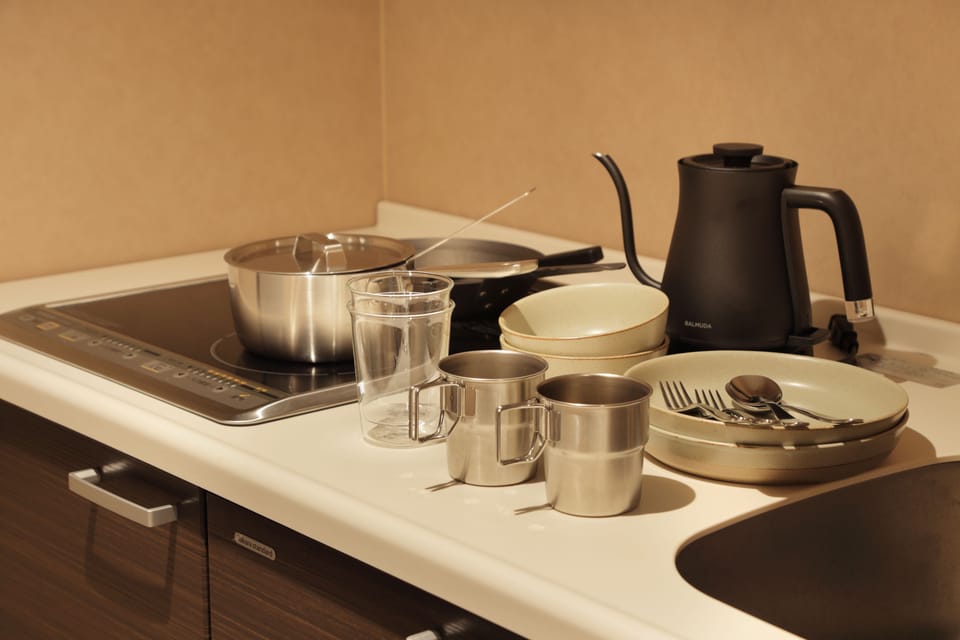 Family Suite Room | Private kitchen | Fridge, electric kettle, toaster