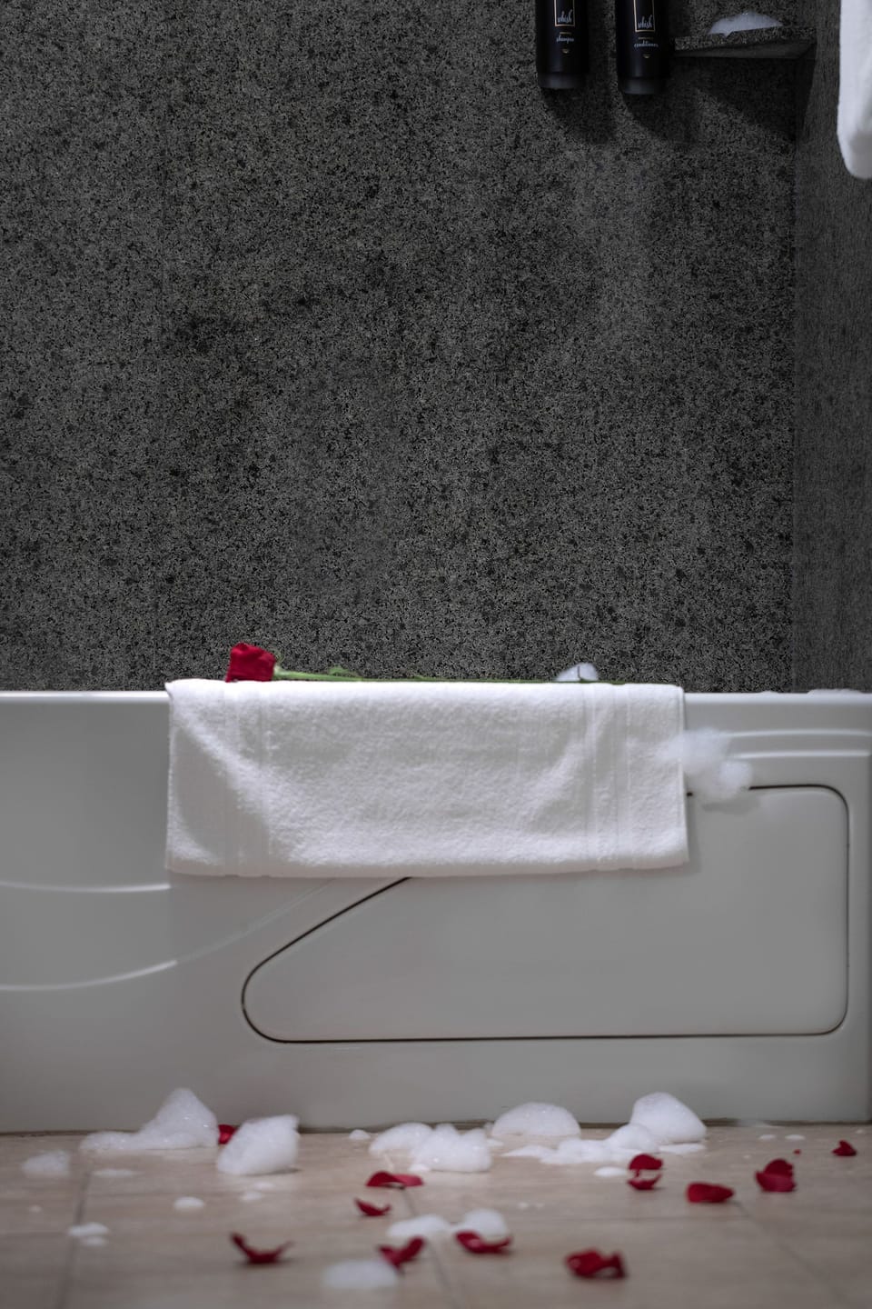 Combined shower/tub, jetted tub, designer toiletries, hair dryer