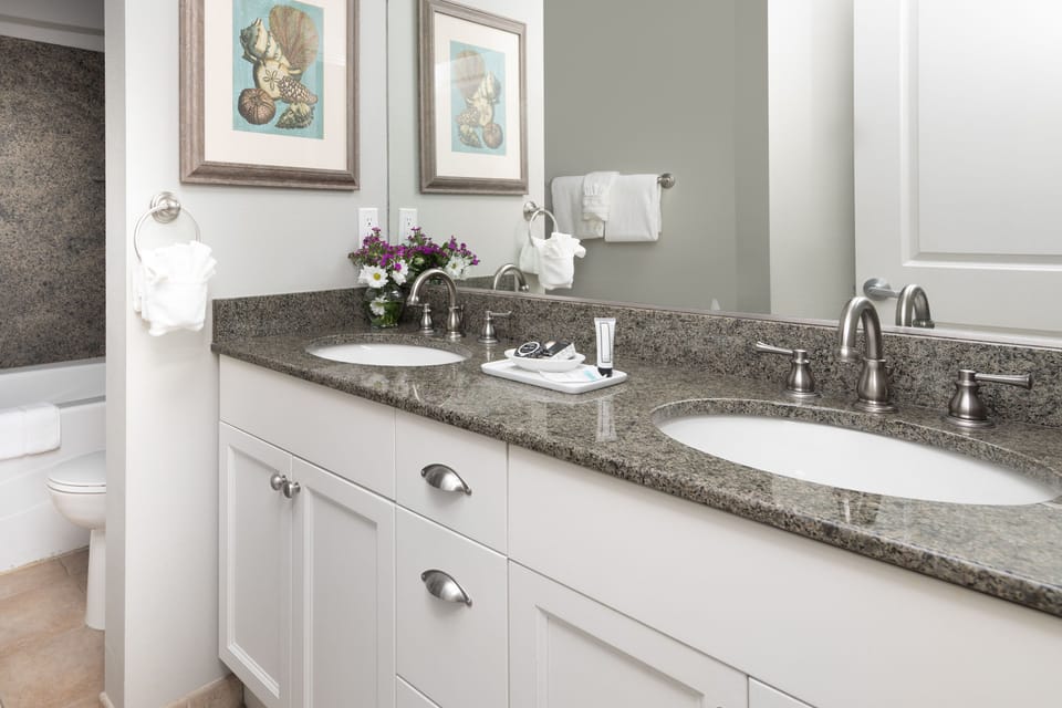 Combined shower/tub, jetted tub, designer toiletries, hair dryer