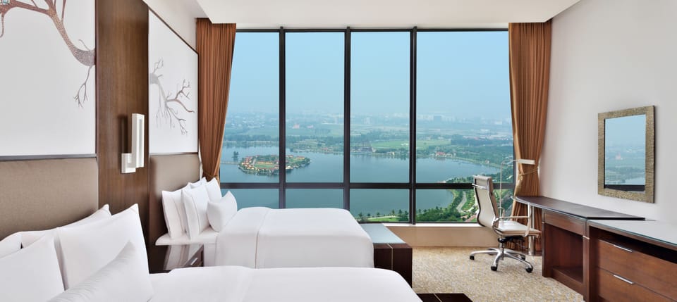 Premium bedding, down comforters, minibar, in-room safe