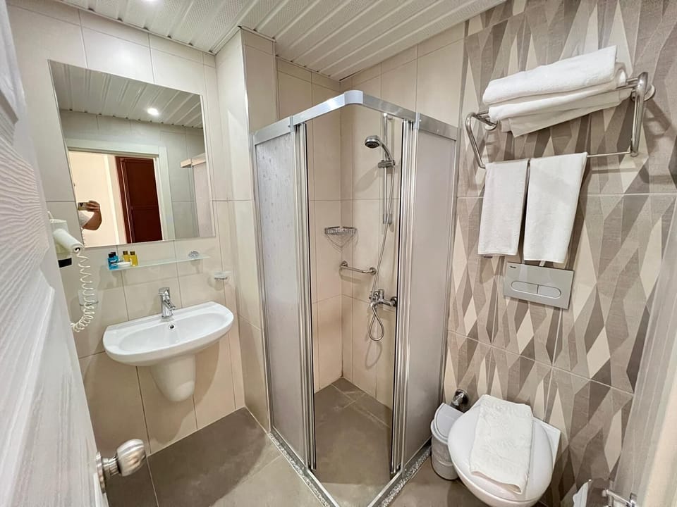 Family Room, 2 Bedrooms | Bathroom | Shower, free toiletries, hair dryer, slippers