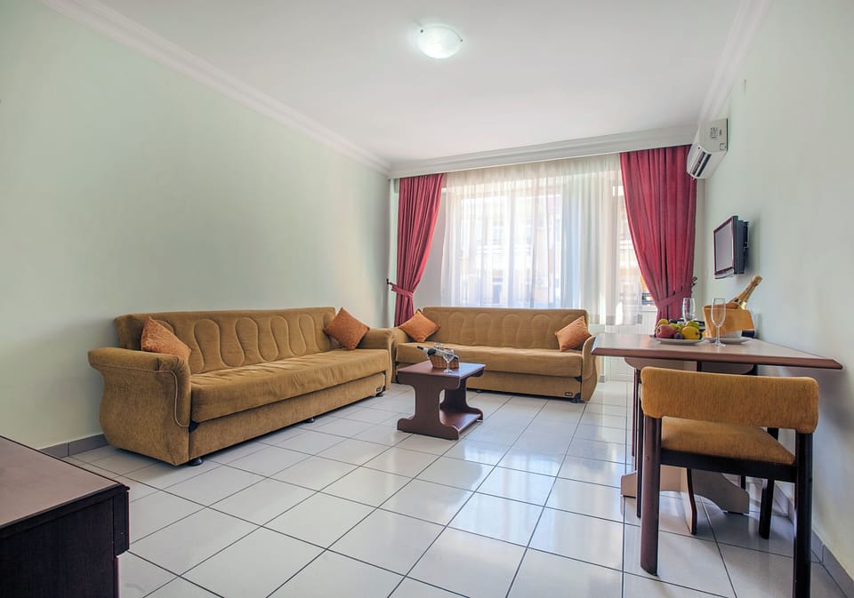 Family Room, 2 Bedrooms | Living area | 43-inch LCD TV with satellite channels, TV, table tennis