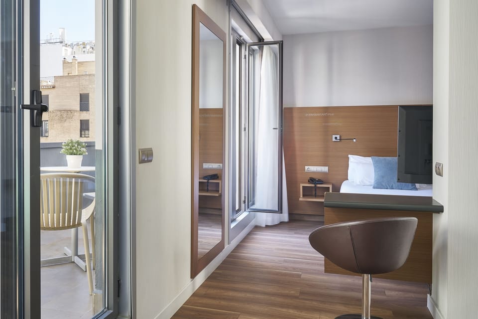 Premium bedding, down comforters, minibar, in-room safe
