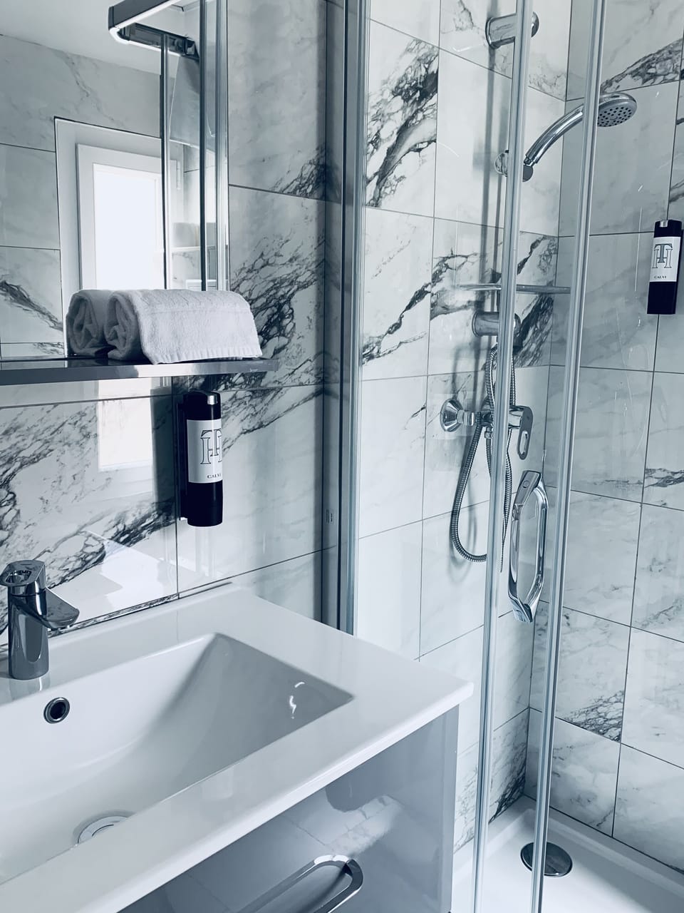 Shower, free toiletries, hair dryer, towels