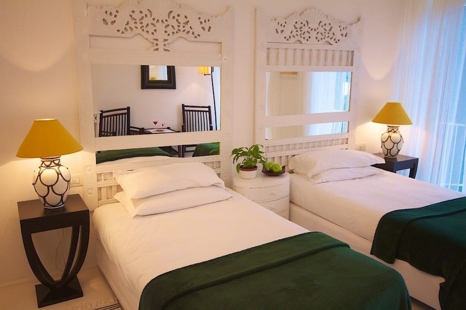 Hypo-allergenic bedding available, memory foam beds, minibar