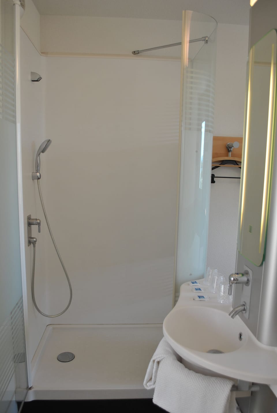 Shower, eco-friendly toiletries, hair dryer, towels