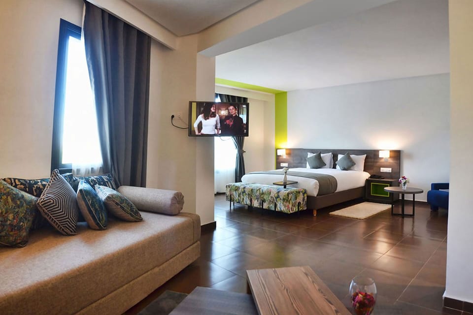 Quadruple Room | Minibar, in-room safe, blackout drapes, soundproofing