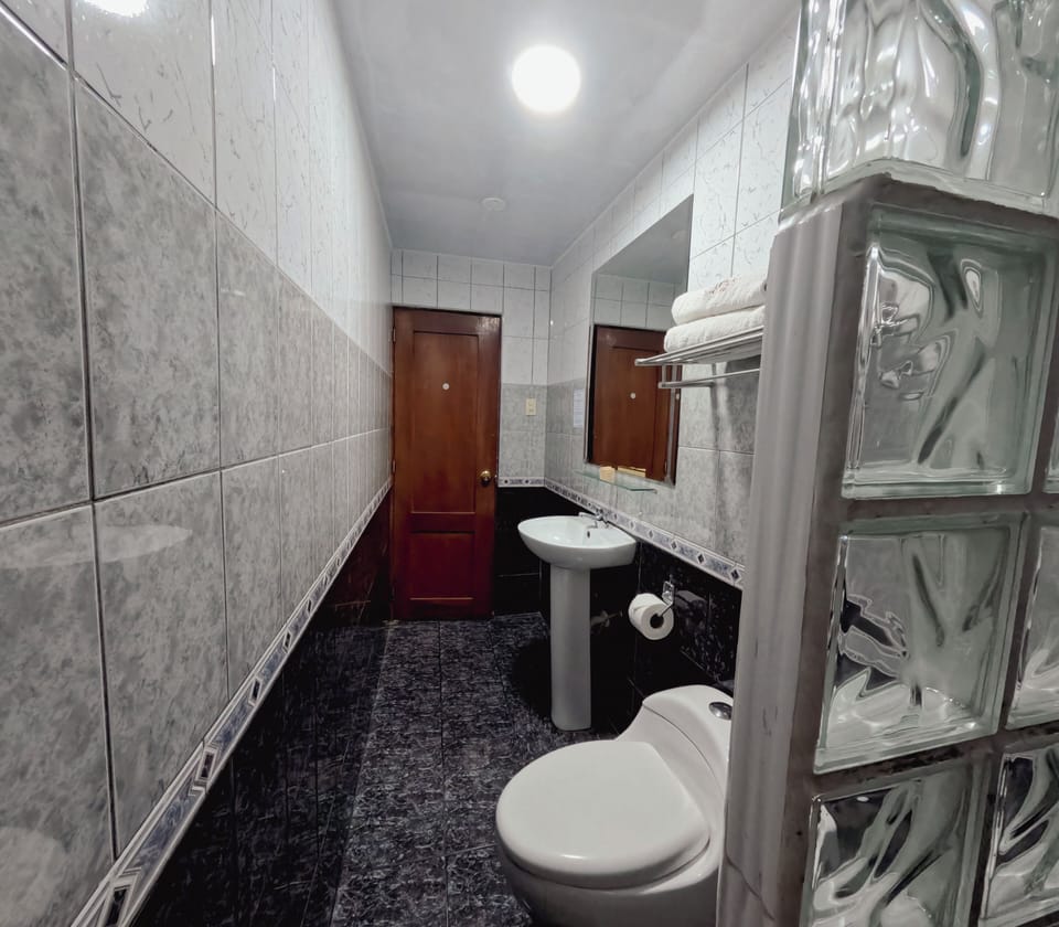Classic Twin Room | Bathroom | Shower, rainfall showerhead, hair dryer (on request), towels