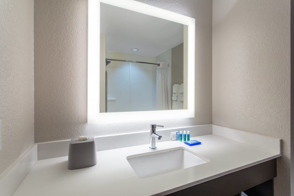 Eco-friendly toiletries, hair dryer, towels, soap