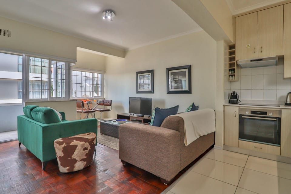 Apartment (1 Bedroom) | Living area | Flat-screen TV, DVD player