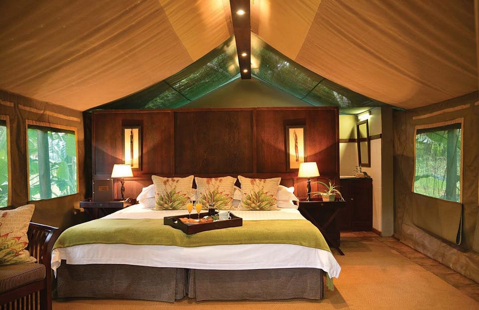 Luxury tented Accommodation twin | In-room safe, desk, free cribs/infant beds, bed sheets