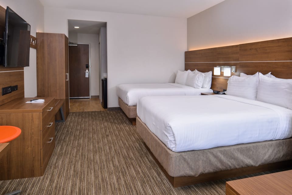 Suite, 2 Queen Beds | Pillowtop beds, in-room safe, desk, blackout drapes
