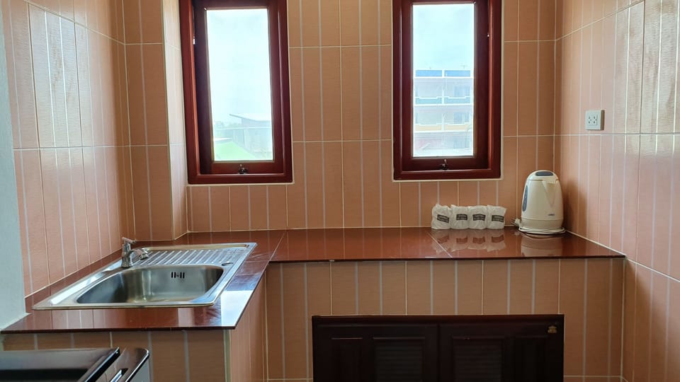 Family Room | Private kitchen | Fridge, coffee/tea maker