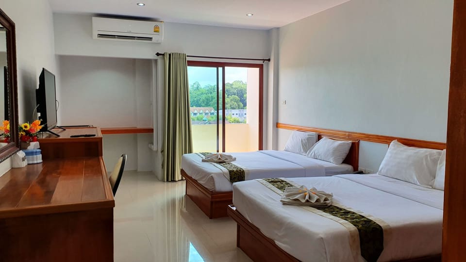 Deluxe Quadruple Room | Premium bedding, in-room safe, free WiFi