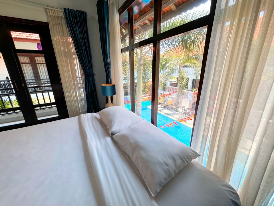 Signature Pool View | In-room safe, desk, blackout drapes, soundproofing