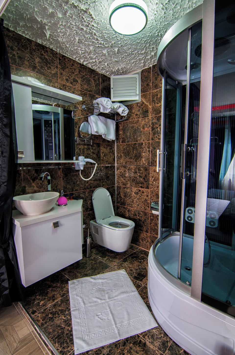 Free toiletries, hair dryer, slippers, towels