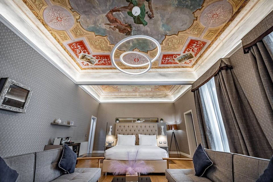 Presidential Studio Suite, Bathtub, City View | Hypo-allergenic bedding available, down comforters, minibar