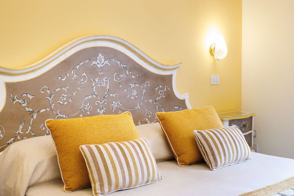 Quadruple Room, Balcony | Minibar, in-room safe, desk, soundproofing