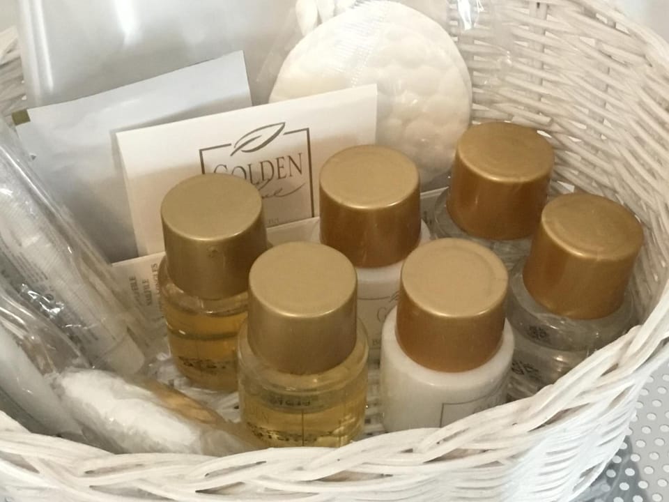 Shower, free toiletries, hair dryer, slippers
