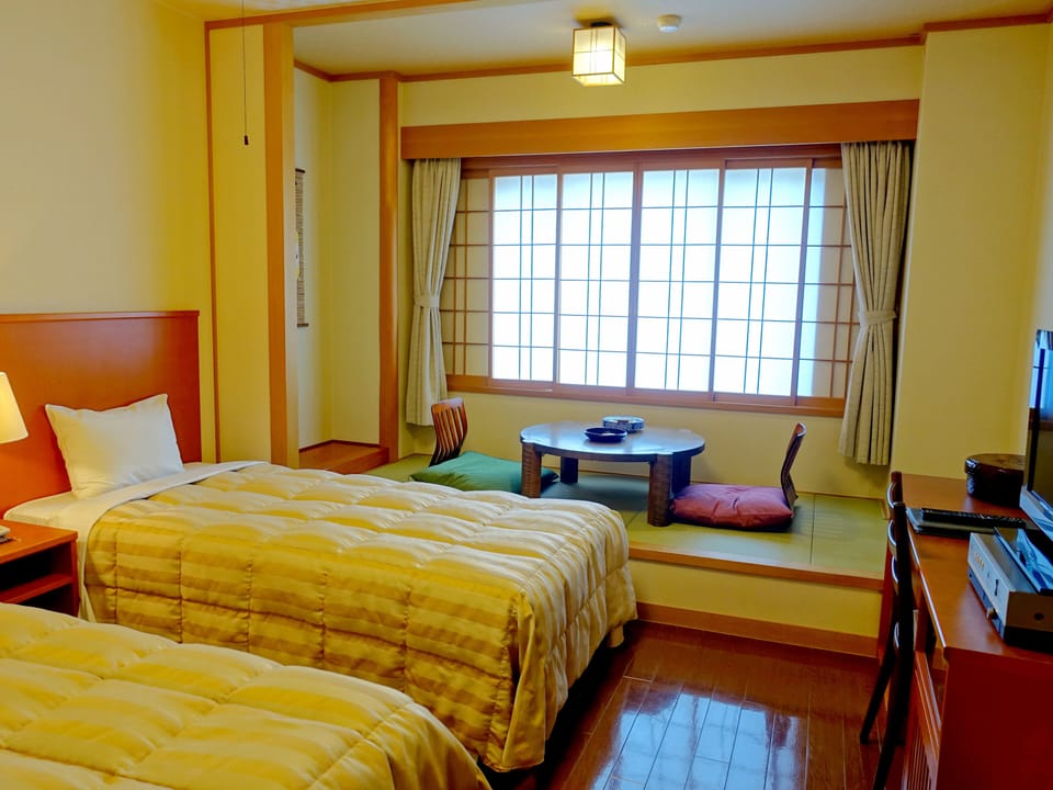 Japanese Western Style Room, Non Smoking (2 Beds + 1 Futon) | In-room safe