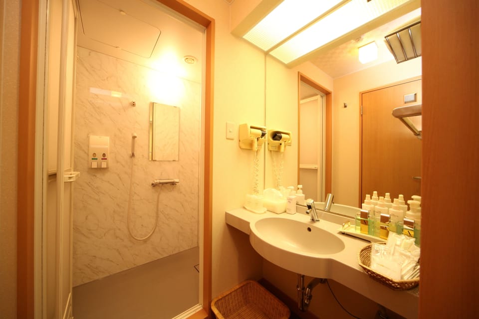 Japanese Western Style Room, Non Smoking (2 Beds + 1 Futon) | Bathroom | Free toiletries, hair dryer, slippers, bidet