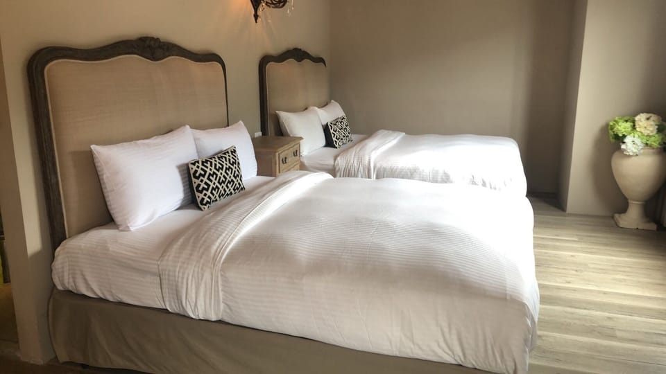 Deluxe Quadruple Room | Blackout drapes, soundproofing, iron/ironing board (on request)