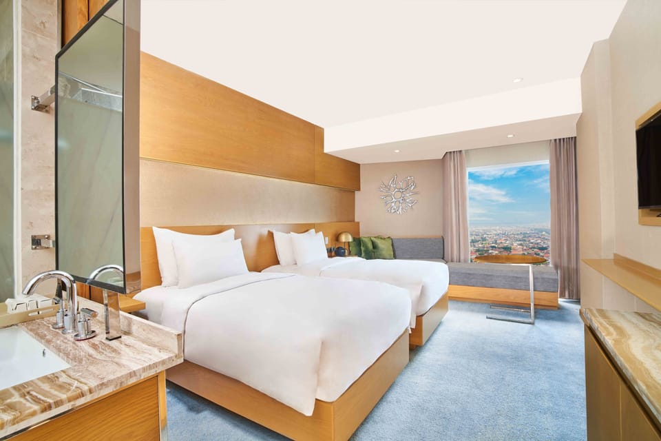 Free minibar, in-room safe, desk, blackout drapes