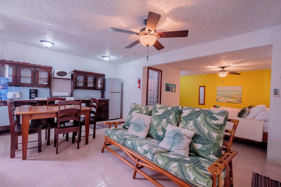 Classic Condo | Living area | 32-inch Smart TV with cable channels, books