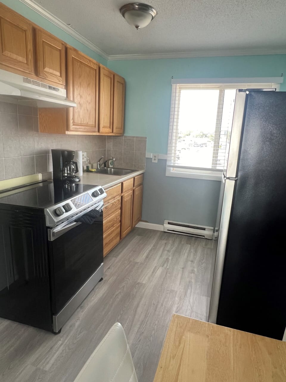 Apartment, 2 Bedrooms, Beach View | Shared kitchen | Fridge