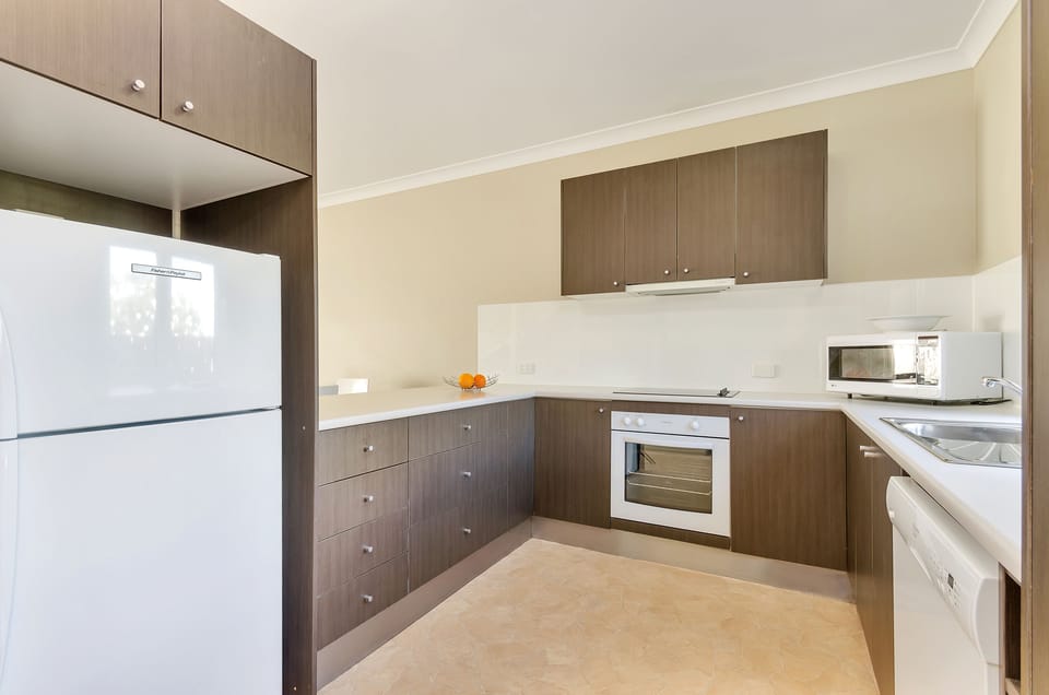 Two Bedroom Apartment | Private kitchen | Coffee/tea maker, electric kettle