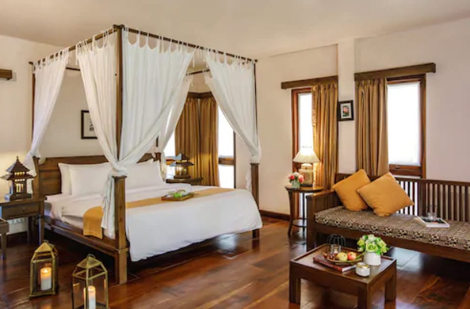 Deluxe Cottage | Minibar, blackout drapes