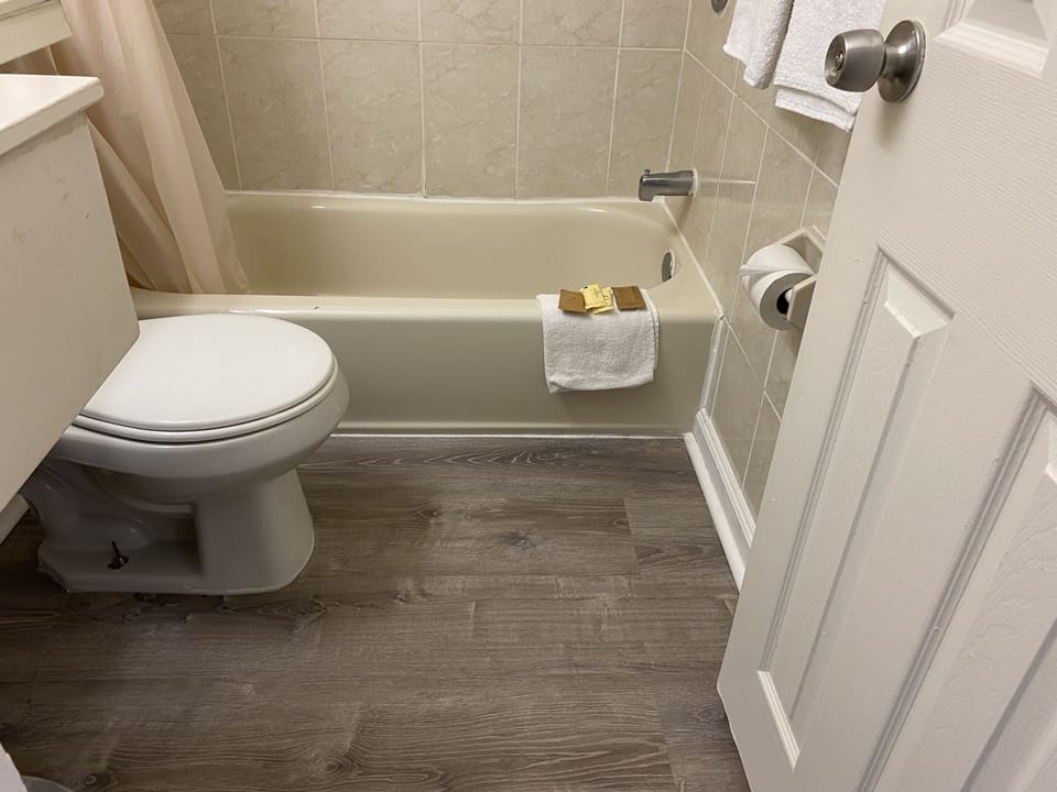 Standard Room, 2 Queen Beds, Non Smoking | Bathroom | Combined shower/tub, towels