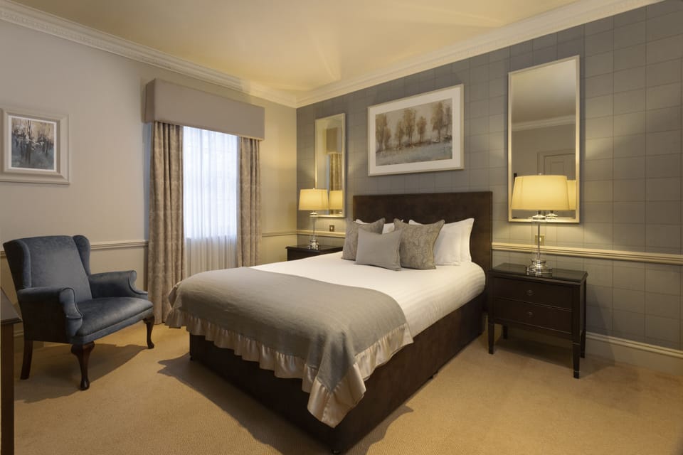 Pillowtop beds, blackout drapes, iron/ironing board, free WiFi