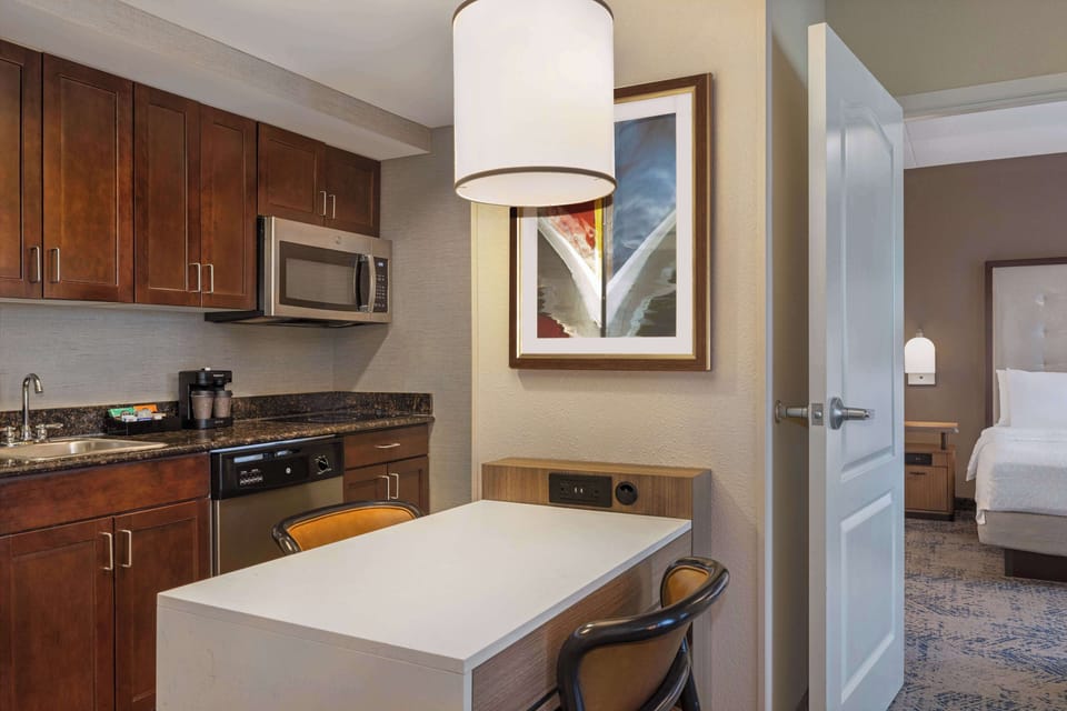 Full-size fridge, microwave, stovetop, dishwasher
