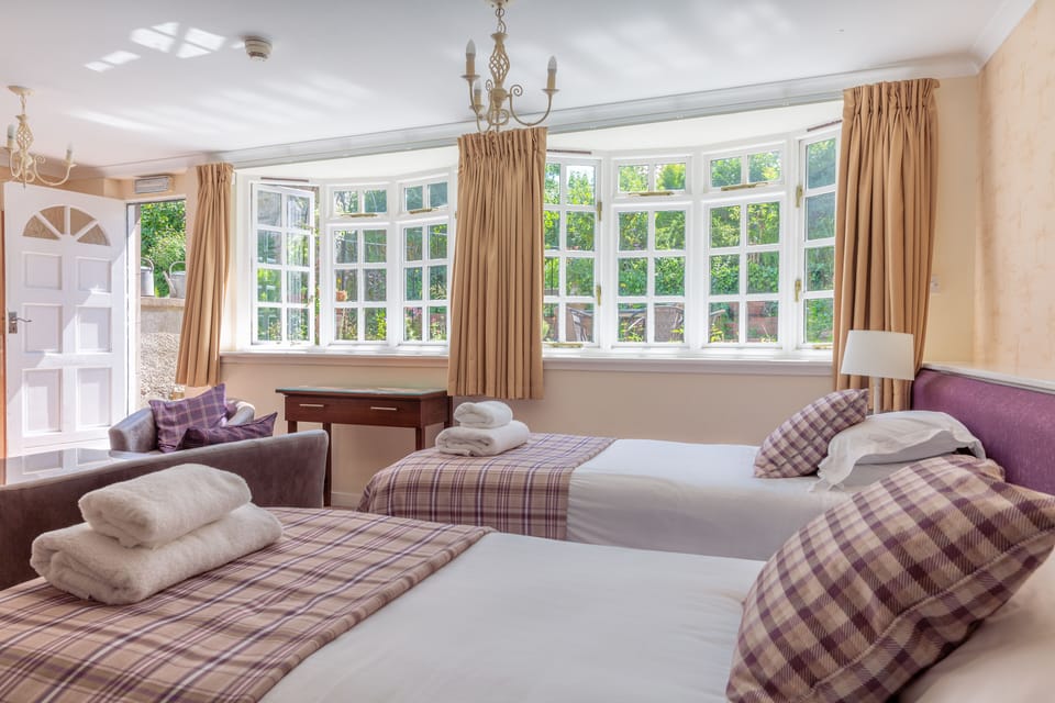 Room, Garden View | Desk, blackout drapes, iron/ironing board, free WiFi