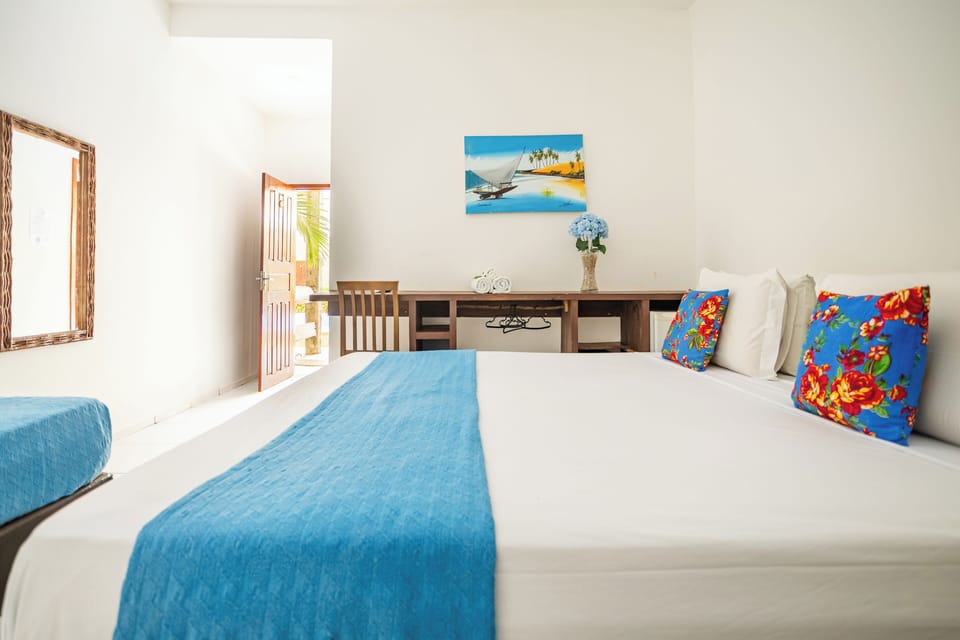 Standard Room, Ground Floor | Minibar, in-room safe, desk, blackout drapes
