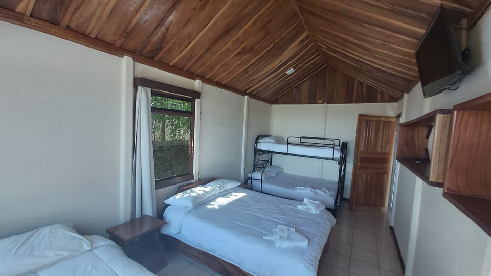 Family Cabin, Kitchenette, Ocean View | 1 bedroom, hypo-allergenic bedding, minibar, individually decorated