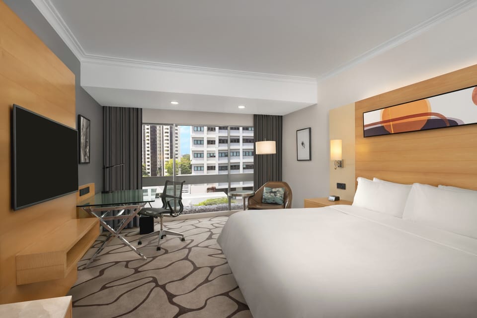 Premium bedding, down comforters, minibar, in-room safe